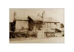 Image: A rare photograph of the old cottage adjacent to the railway bridge on the Frolesworth Road opposite the riding stables